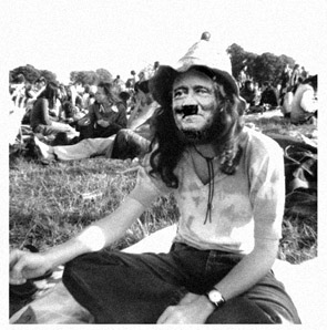 Hitler as a member of the Hippies movement with the typical moustache, long hair and knucklebones